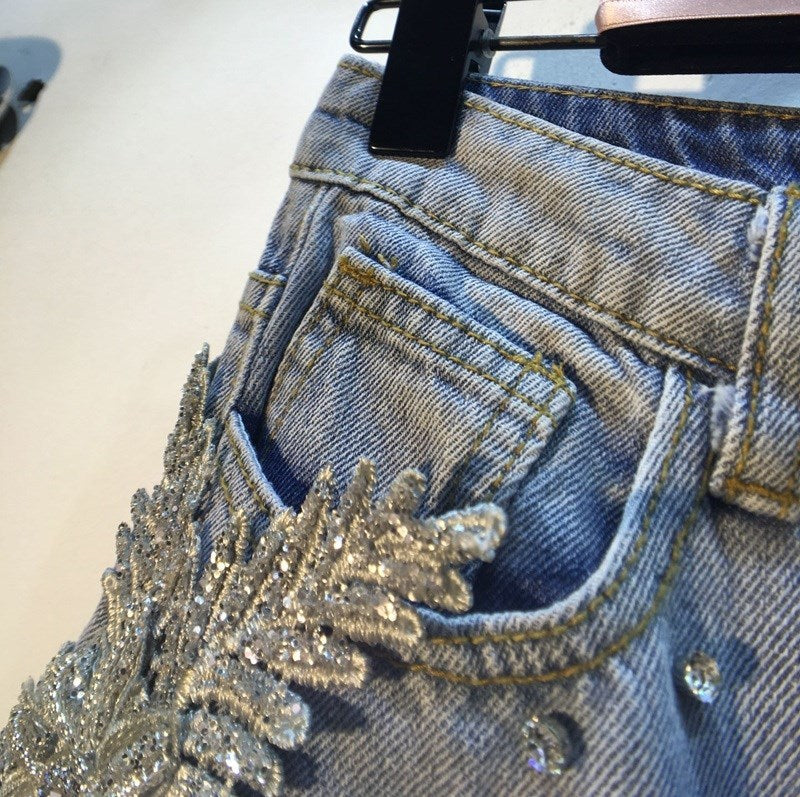 Ripped Jeans With Diamond Flowers