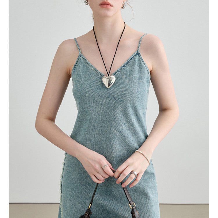 Female slim fit waist cinched denim camisole dress