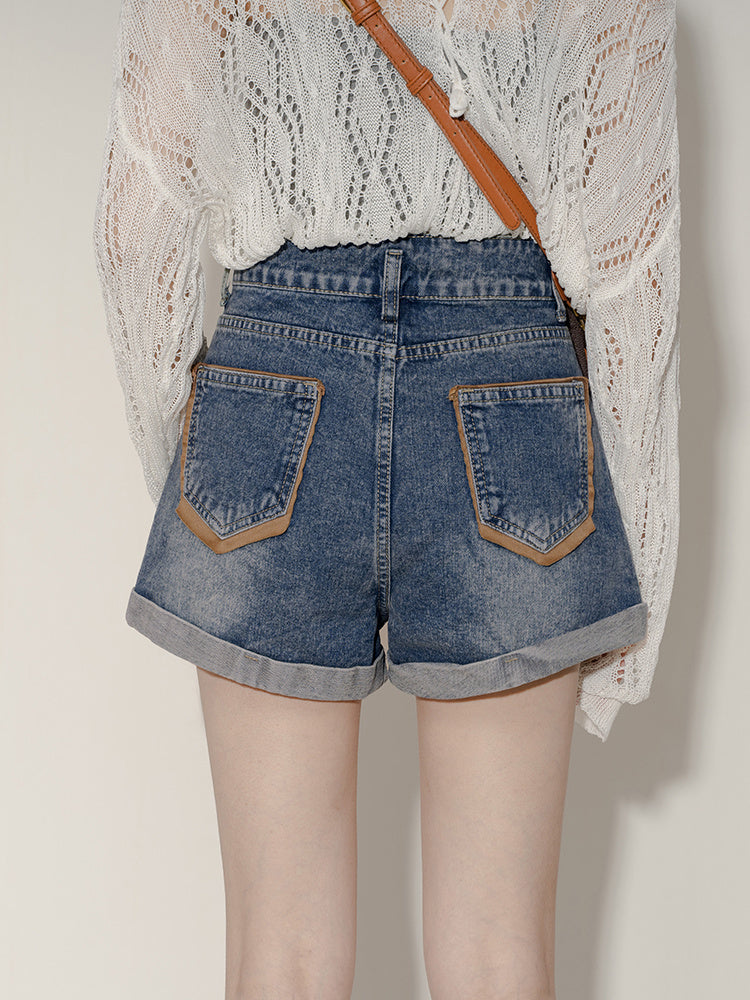 High waisted rolled denim shorts with women's design sense