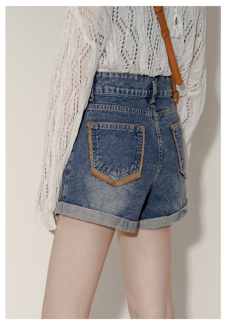 High waisted rolled denim shorts with women's design sense