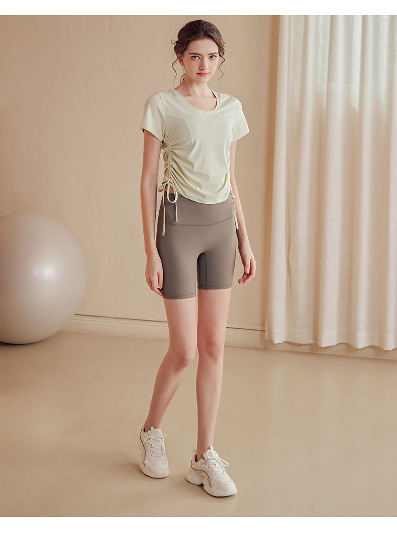 Sports tops for women to look slimmer in summer